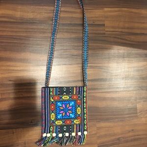 multicolored (typical) cross body bag
